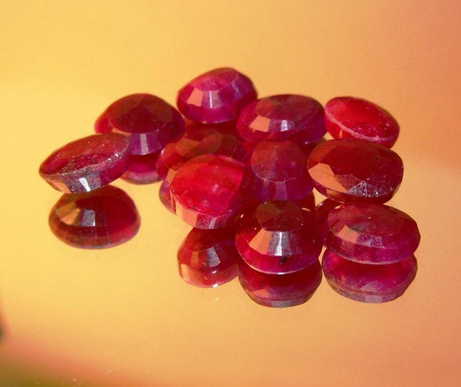 41 tcw Ruby Parcel - $ 7600 GG GIA: All of our evaluations use some or all of the following Gemological tools. : A fully corrected triplet loupe, binocular microscope, master color comparison diamond set, electronic carat balancing scal