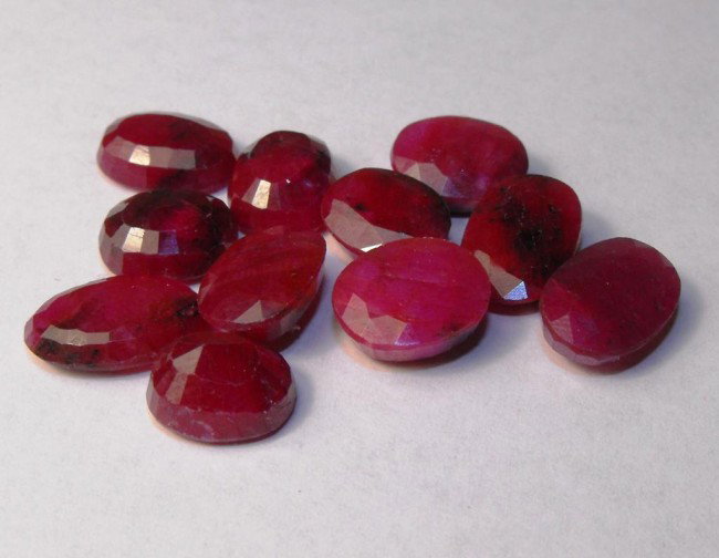 44 tcw Ruby Parcel- $ 3000 GG GIA: All of our evaluations use some or all of the following Gemological tools. : A fully corrected triplet loupe, binocular microscope, master color comparison diamond set, electronic carat balancing scal