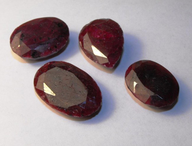 217 tcw Ruby Parcel - $5600 GG GIA: All of our evaluations use some or all of the following Gemological tools. : A fully corrected triplet loupe, binocular microscope, master color comparison diamond set, electronic carat balancing scal