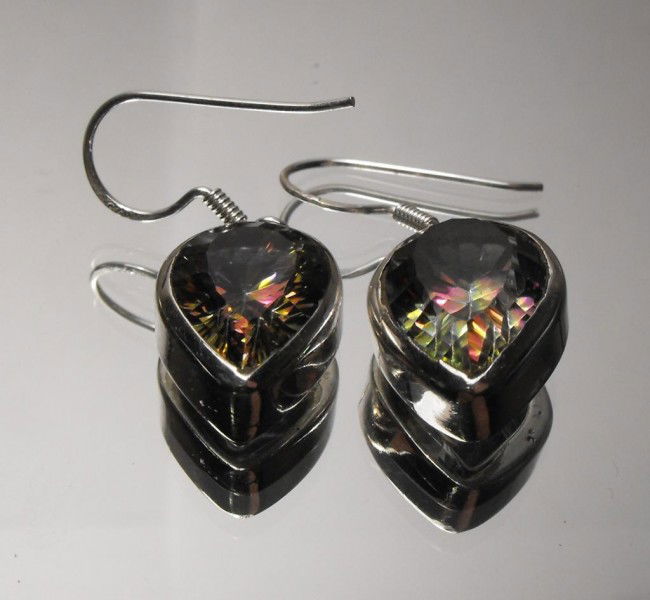 8.04 tcw Mystic Topaz E/R Sterling $ 1345 GG GIA: This item was appraised with the gemstone in mount. Each gemstone has been evaluated on a case by case basis, some stones are higher quality than others and will be more valuable than larger stones of