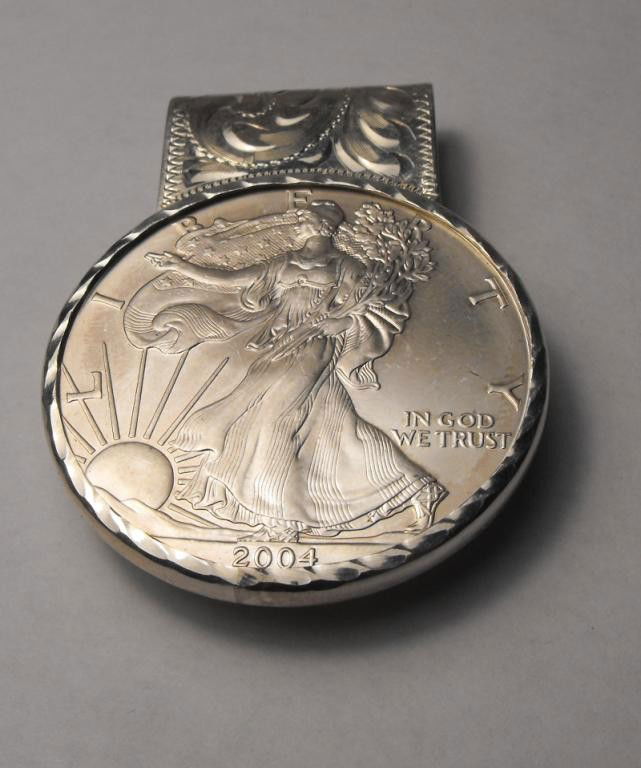 2004 Silver Eagle Money Clip: As shown -We offer at auction some of the best quality tangible assets. We strive to make your bidding experience the best on the net. Weekly sales of large bulk lots, individual lots and simply the m