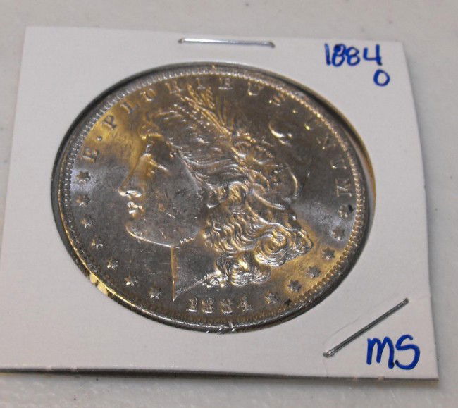 1884 o MS Morgan: This item has been placed into slab/holder/2x 2 by a third party prior to it being listed by us, we do not know the grades of the items.Evaluation should be based upon visual inspection via photo- Thi