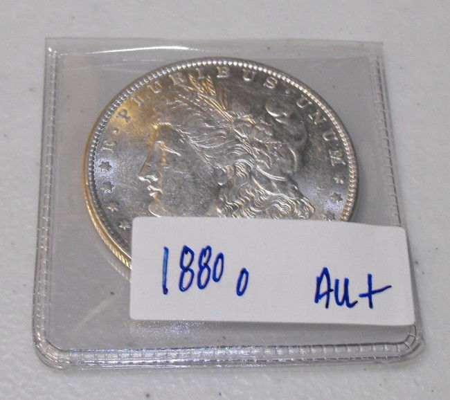 1880 o AU Plus Morgan: This item has been placed into slab/holder/2x 2 by a third party prior to it being listed by us, we do not know the grades of the items.Evaluation should be based upon visual inspection via photo- Thi
