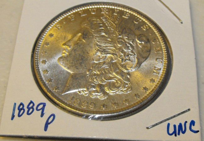 1889 P UNC Morgan: This item has been placed into slab/holder/2x 2 by a third party prior to it being listed by us, we do not know the grades of the items.Evaluation should be based upon visual inspection via photo- Thi