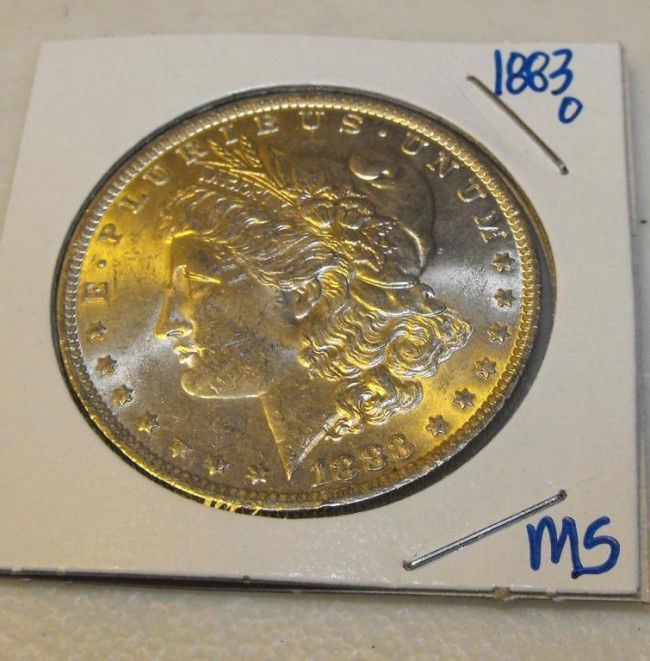 1883 O MS Morgan: This item has been placed into slab/holder/2x 2 by a third party prior to it being listed by us, we do not know the grades of the items.Evaluation should be based upon visual inspection via photo- Thi