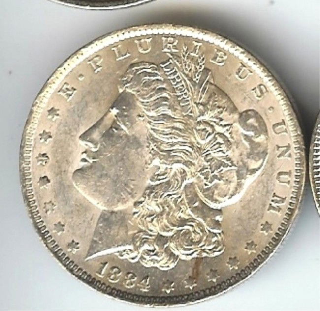 1884 O Morgan SIlver Dollar: This lot is as shown and graded by the previous owner, whether it is hand graded or by a recognized company. This is the exact item you will be sent.DescriptionDescriptionDescriptionDescription