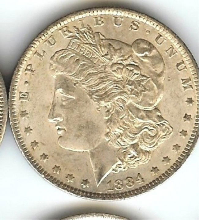 1884 UNC Morgan Silver Dollar: This lot is as shown and graded by the previous owner, whether it is hand graded or by a recognized company. This is the exact item you will be sent.DescriptionDescriptionDescriptionDescription