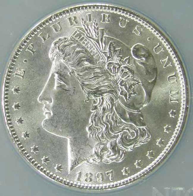 1897 UNC Morgan Silver Dollar: This lot is as shown and graded by the previous owner, whether it is hand graded or by a recognized company. This is the exact item you will be sent.DescriptionDescriptionDescriptionDescription