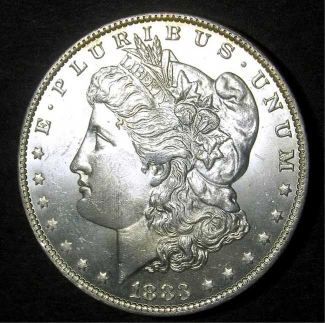 1883 O Morgan Silver Dollar: This lot is as shown and graded by the previous owner, whether it is hand graded or by a recognized company. This is the exact item you will be sent.DescriptionDescriptionDescriptionDescription