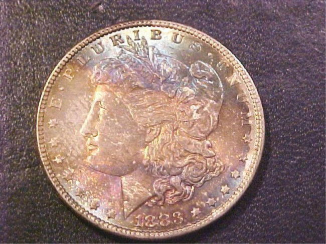 1883 O Morgan Silver Dollar: This lot is as shown and graded by the previous owner, whether it is hand graded or by a recognized company. This is the exact item you will be sent.DescriptionDescriptionDescriptionDescription