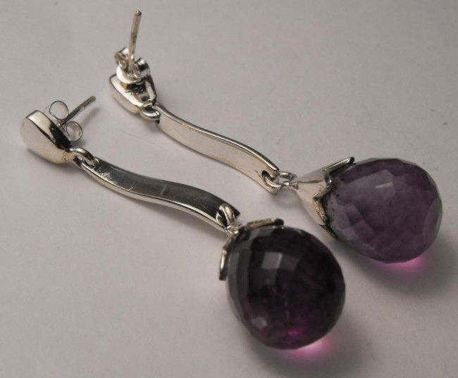 9.68 tcw Amethyst Brio's E/R Silver $ 890 GG GIA: This item was appraised with the gemstone in mount. Each gemstone has been evaluated on a case by case basis, some stones are higher quality than others and will be more valuable than larger stones of