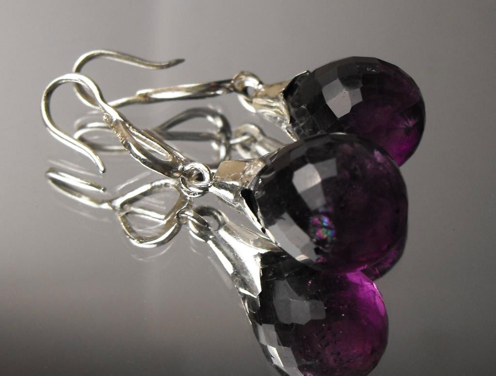 27.75 tcw Amethyst Brio E/R Sterling $ 1050 GG GI: This item was appraised with the gemstone in mount. Each gemstone has been evaluated on a case by case basis, some stones are higher quality than others and will be more valuable than larger stones of