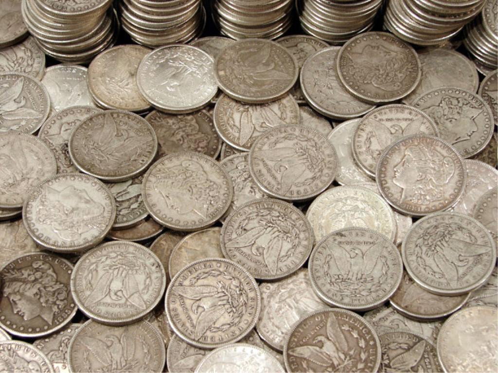 (100) Morgan Silver Dollars: We offer at auction some of the best quality tangible assets. We strive to make your bidding experience the best on the net. Weekly sales of large bulk lots, individual lots and simply the most offeri
