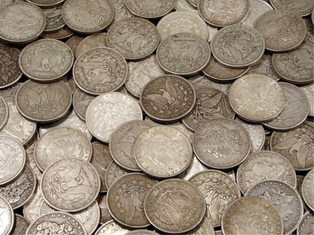 (100) Morgan Silver Dollars - AG -AU: We offer at auction some of the best quality tangible assets. We strive to make your bidding experience the best on the net. Weekly sales of large bulk lots, individual lots and simply the most offeri