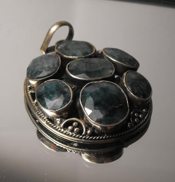 18.02 tcw Emerald Pendant Silver $ 2100 GG: This item was appraised with the gemstone in mount. Each gemstone has been evaluated on a case by case basis, some stones are higher quality than others and will be more valuable than larger stones of