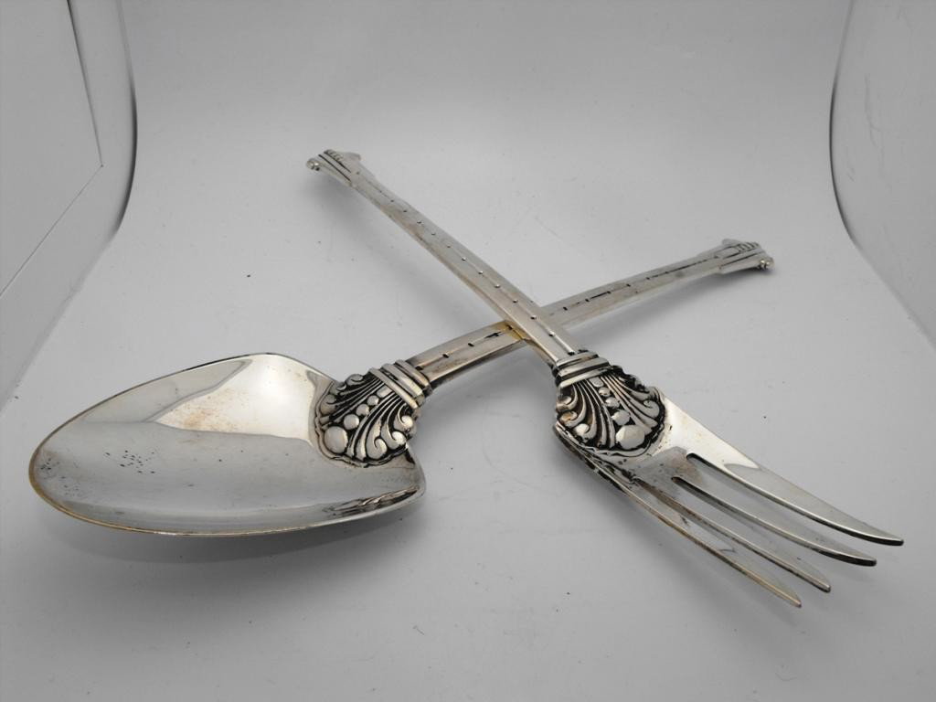 Tiffany & Co. Sterling Serving Utensils: Tiffany & Co. Sterling Serving Set (2 pc). Estimate: 750-900 A pair of sterling Tiffany & Co. serving utensils. A desert set with a p monogram. Measurements: 10"Condition: Eccellent Provenance: From a