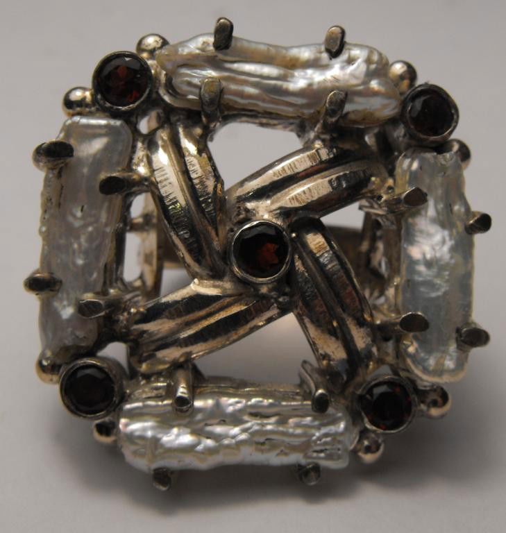 Designer Pearl and Garnet Ring $ 2500 GG GIA: This item was appraised with the gemstone in mount. Each gemstone has been evaluated on a case by case basis, some stones are higher quality than others and will be more valuable than larger stones of