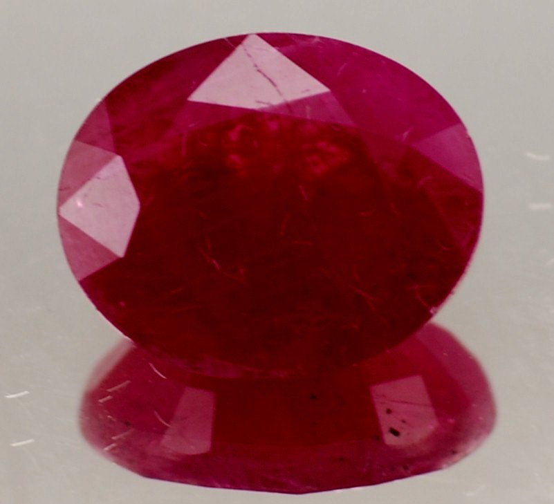 3 ct. Natural Ruby Gem: 3 ct. Natural Ruby Gem This is a natural gemstone direct from the earth. Showing all natural occurances.