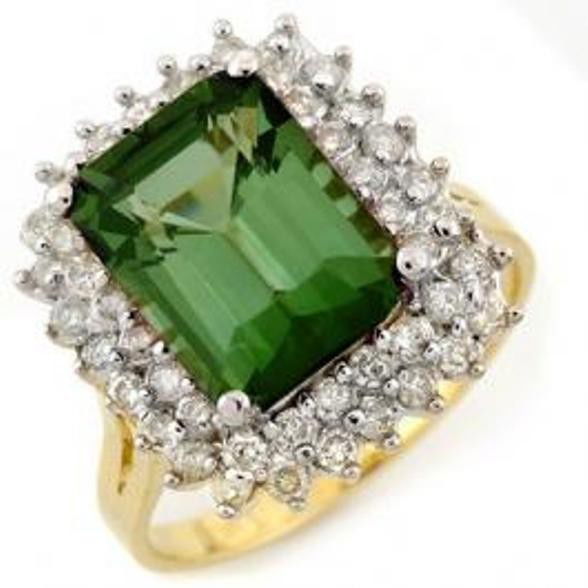 4.75ct Green Tourmaline & Diamond Ring 14K Gold: Diamond: 48 Round cut @ 0.75 ctw Clarity: SI-I Color: H-K Gemstone: Natural Tourmaline Gemstone color: GreenGemstone quality: Good-to-Very Good Gemstone Cut & Weight: 1 Emerald cut @ 4.0 ctw Metal Pur