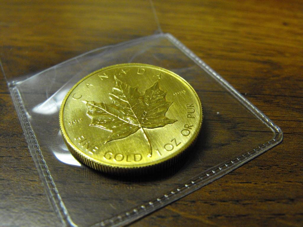 1 oz. Gold Maple Leaf Bullion - Random: We offer at auction some of the best quality tangible assets. We strive to make your bidding experience the best on the net. Weekly sales of large bulk lots, individual lots and simply the most offeri