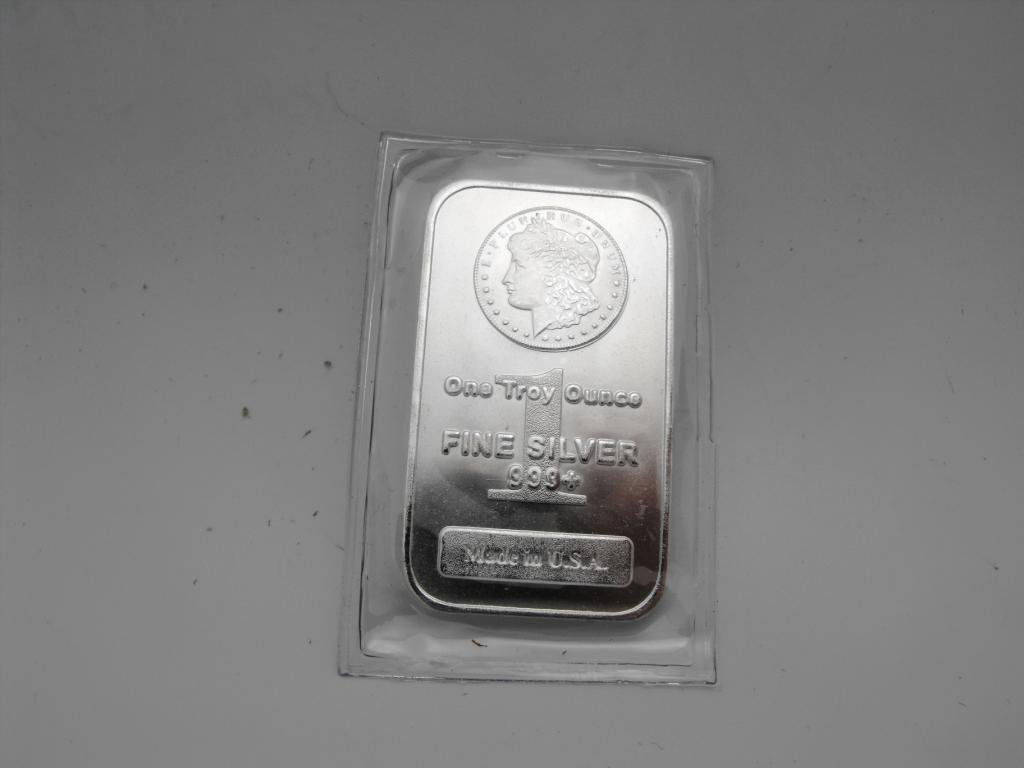(1) SIlver Morgan Bar: Item is the exact item a shown in the photo. Please use the photo to determine grade.