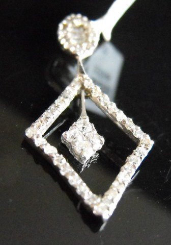 RA- FINE 1.21 TCW Diamond Pendant 18K $4206 MSRP: Diamond Clarity: SI1-SI2; ; Diamond Color: G-H ; Metal: 18KT ; Gold: White Gold ; Gold Weight: 1.8 ; Diamond Count: 60RD ; Diamond Weight: 0.51 ; Diamond Count 2: BG ; Diamond Weight 2: 0.7 $4506 MSRP