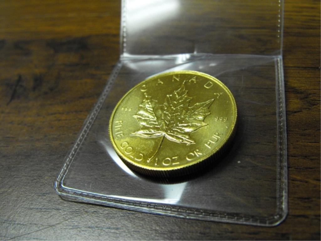 1 Oz. Pure Gold .999 or better Maple Leaf: .999 or better Bullion coin Gold Maple Leaf.