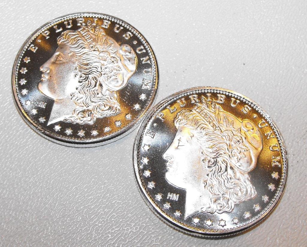(2) 1 oz Morgan Design Rounds Silver: The item is the item as shown in picture. All sales are final and no refunds or exchanges. Please bid accordingly.