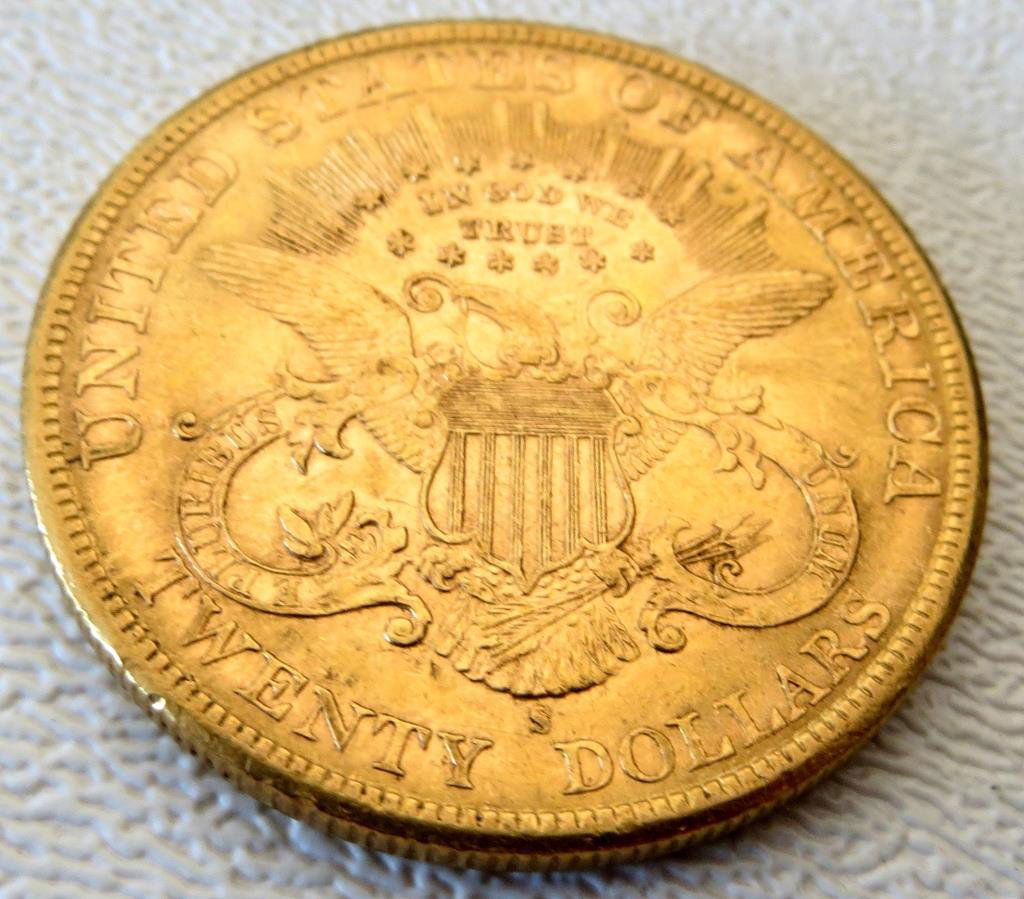 1897 S UNC $ 20 Liberty Gold Coin: An uncirculated $ 20 US Gold coin. item is exact coin in picture. All grades are up to the bidder, please note all terms apply. All sales final.