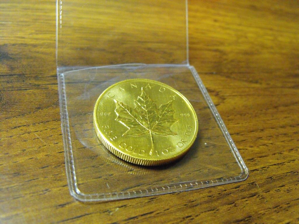 1 oz. Gold Maple Leaf Bullion - Random: We offer at auction some of the best quality tangible assets. We strive to make your bidding experience the best on the net. Weekly sales of large bulk lots, individual lots and simply the most offeri