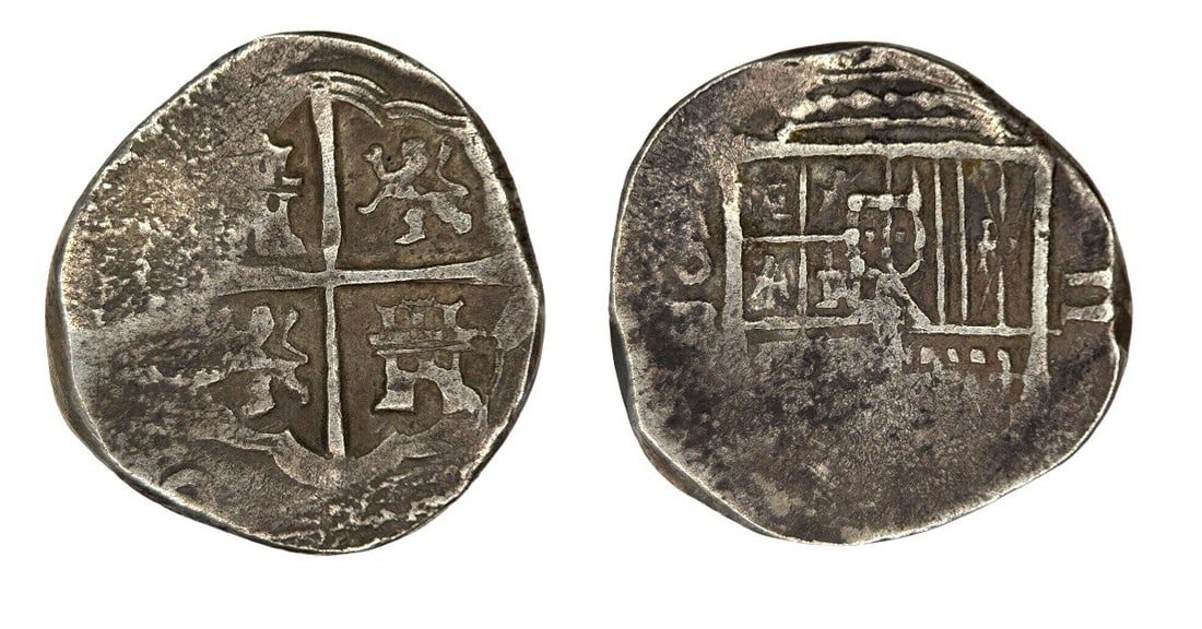 Medieval Coins: Spain. Philip, AR, 2 reales. (6.27g).Obv: [PHILIPPVS D G HISPANIA]. Crowned arms.Rev: Cross with castles and lions in angles, in octolobe. Legend with date around