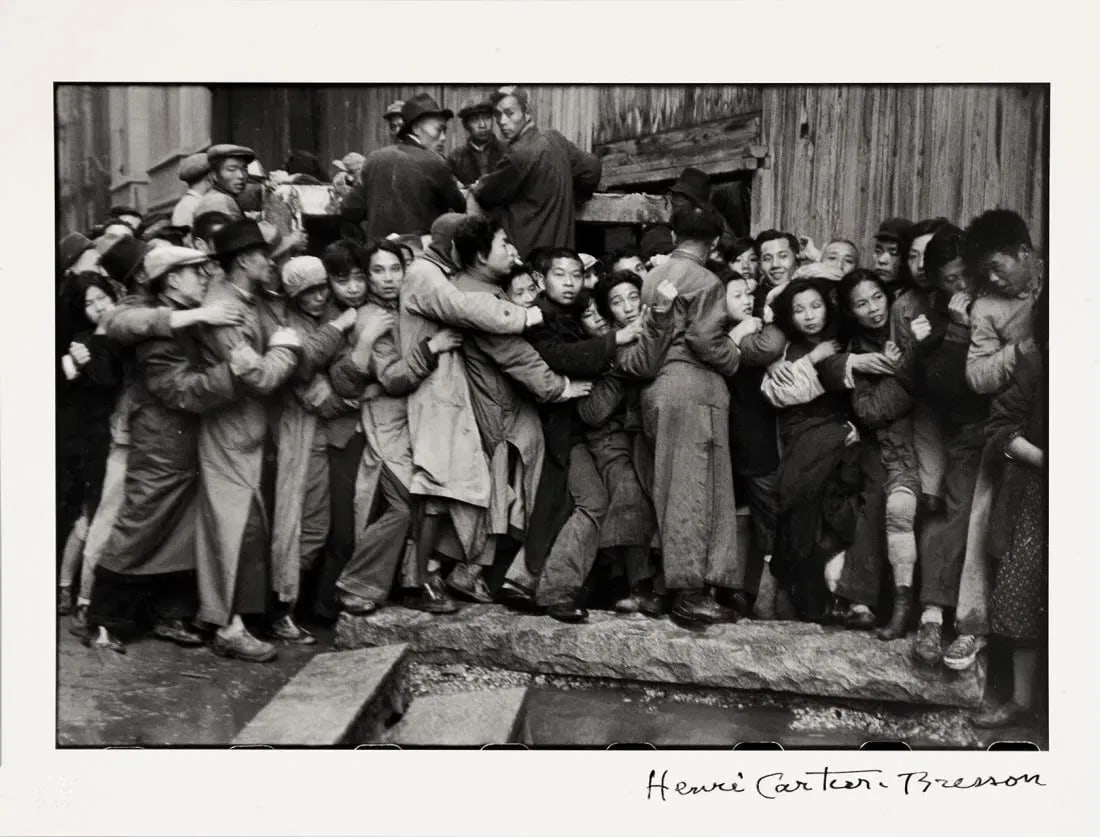 HENRI CARTIER-BRESSON: Last Days of the Kuomintang, Shanghai. Glossy photo printMeasures 20.00 X 16.00 Inches Signed in the Plate.