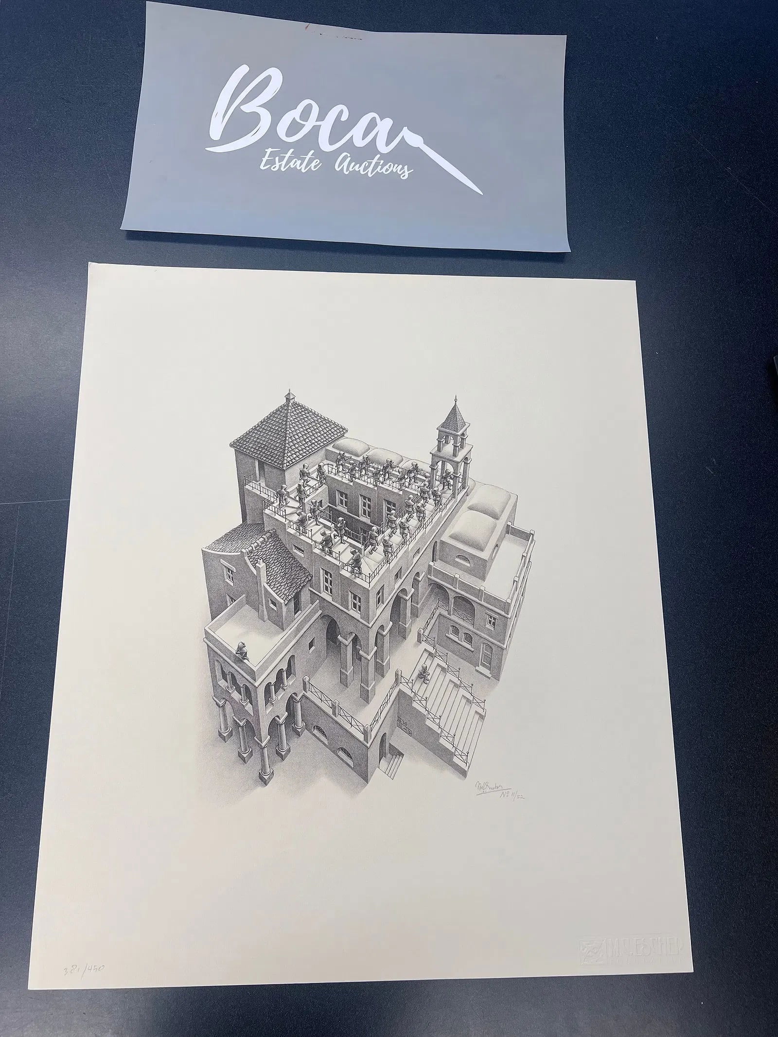 M.C. Escher "Assending" Etching, watermark, signed and numbered: M.C. Escher "Assending" Etching, watermark, signed and numbered, Measures 21.00 X 25.00 Inches.