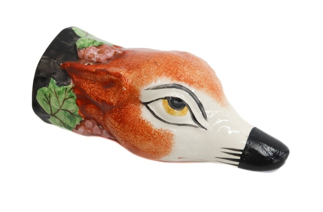 English Staffordshire Porcelain Stirrup Cup of a Fox, 19th Century: English Staffordshire porcelain stirrup cup of a fox, 19th Century. Hand painted with a grapes and leaves to the neck. Weight: Approx. 1 lbs Measurements: Approx. 5 inches x 2.5 inches x 2 inches Cond