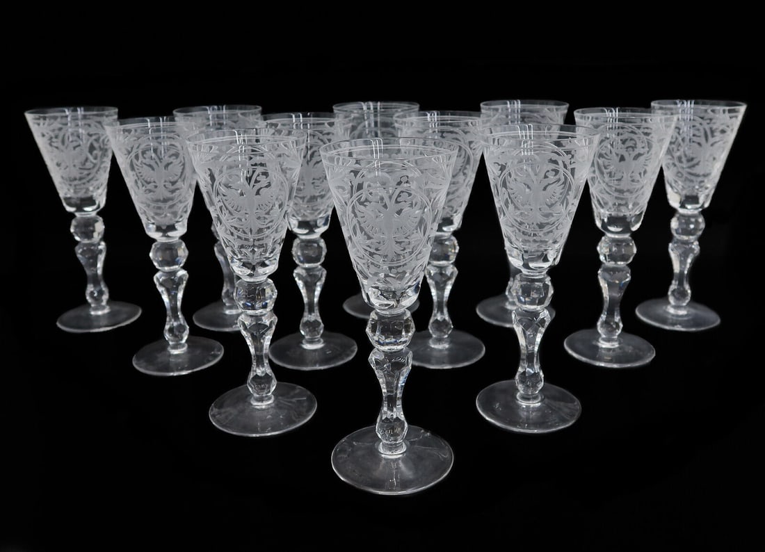 12 Russian Cut Glass Wine Goblets Peter the Great circa 1900: 12 Russian cut glass wine goblets - Peter the Great, circa 1900. Intricately etched Coat of Arms of Russia to each glass along with Peter the Great's intertwined P initials. Foliate scroll designs thr