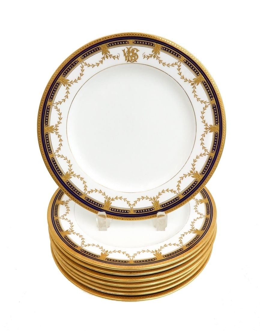 8 Coalport England Porcelain Cobalt Blue and Gilt Dinner Plates circa 1900: 8 Coalport England porcelain cobalt blue and gilt dinner plates, circa 1900. Cobalt blue rim with gilt swag accents. Monogrammed "WLS" to top center. Coalport England mark to underside. Weight: Approx