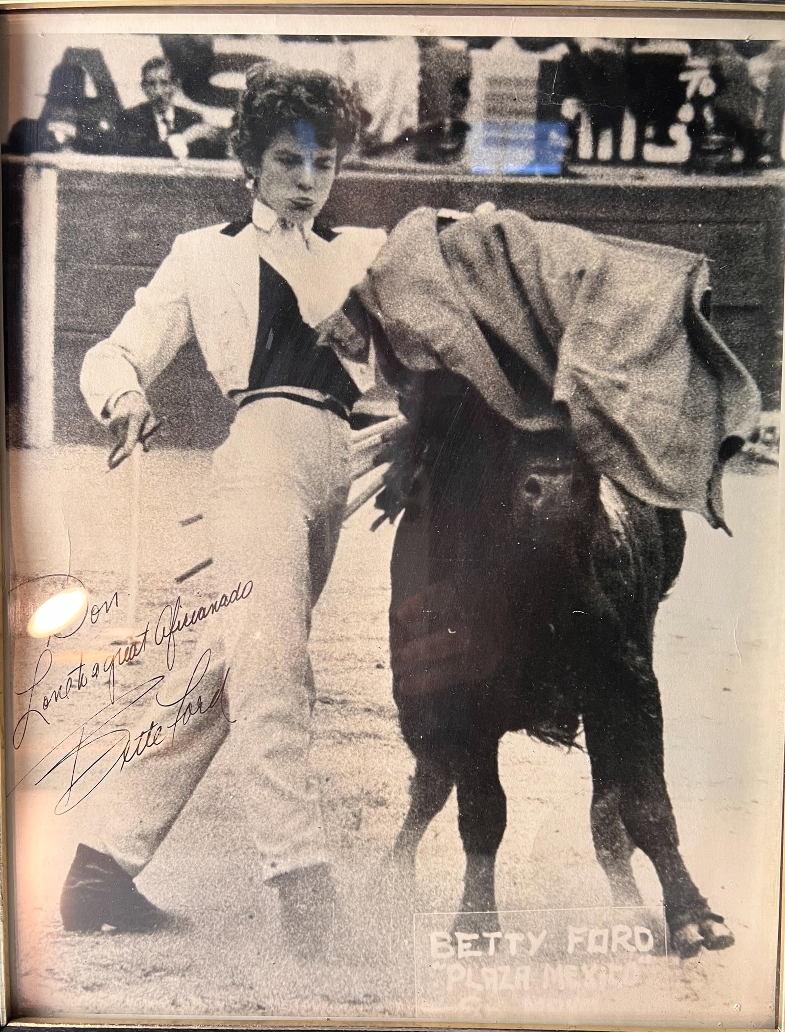 Bette Ford Bullfighter Autographed inscribed Photograph: Bette Ford (1927-) Autographed inscribed Photograph, in Plaza Mexico. Inscribed "Don, Love to a great aficianado, Bette Ford". In wood frame, glazed. 2lb an American actress and model turned professio