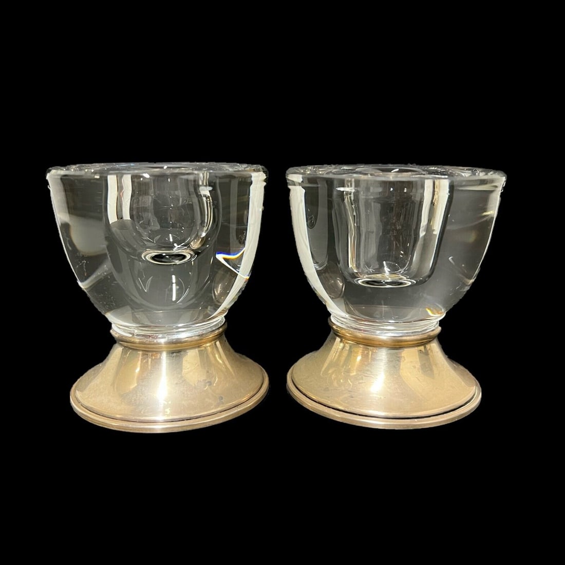 Pair of Frank Whiting Sterling Silver Glass Candle holders: Pair of Frank Whiting & Co. Sterling Silver Glass Candle holders. Sterling bases, thick glass holders. Makers mark on base, marked Sterling. 1.3lb Measurements: Approx. 3 inches height x 2.375 inches 