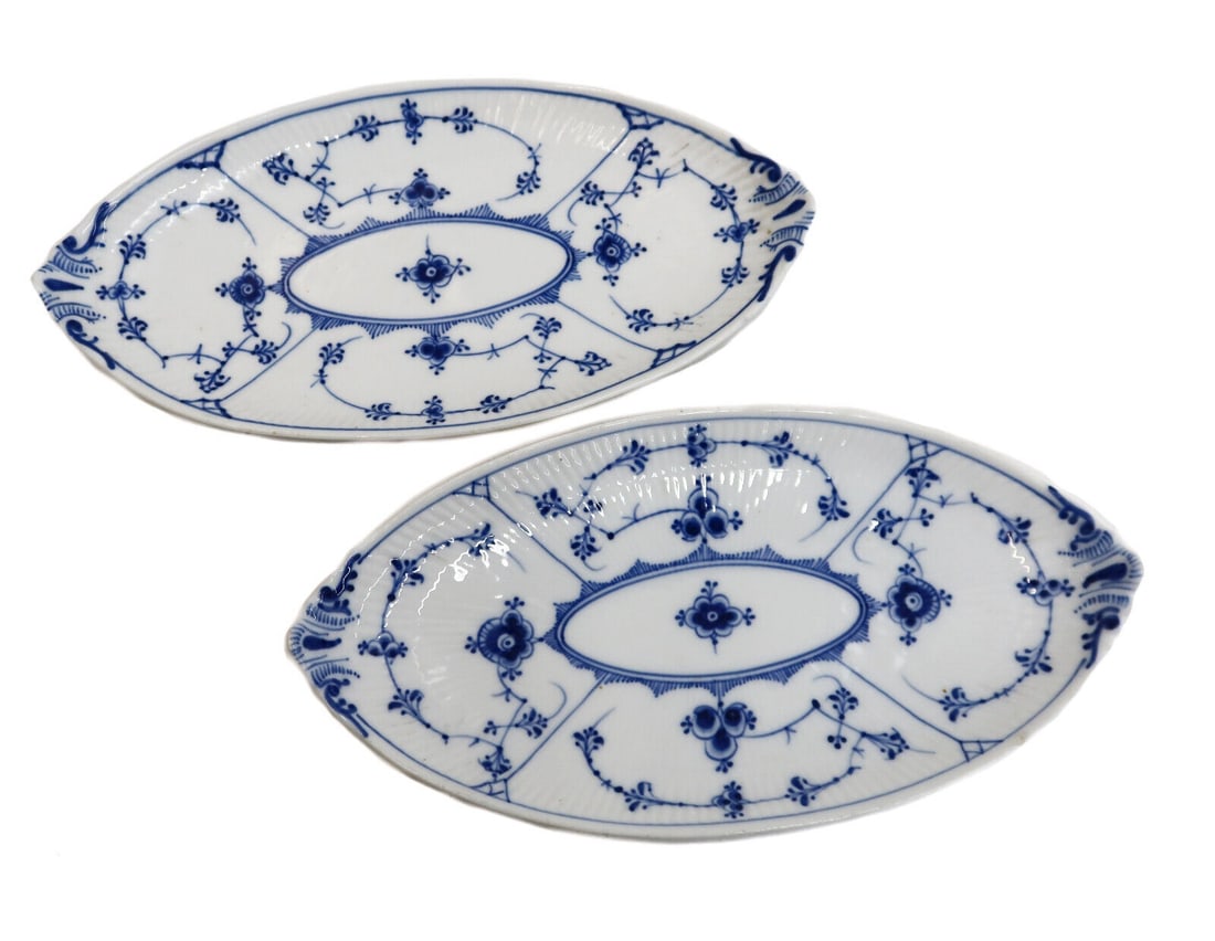 Pair Royal Copenhagen Denmark Porcelain Fluted Plain Lace Pickle Dishes #263: Pair Royal Copenhagen Denmark Porcelain Fluted Plain Lace Trivets #263, 1889-1922. Fluted porcelain with a delicate blue floral design. Underside with Royal Copenhagen marks, #263 with a strike to mar