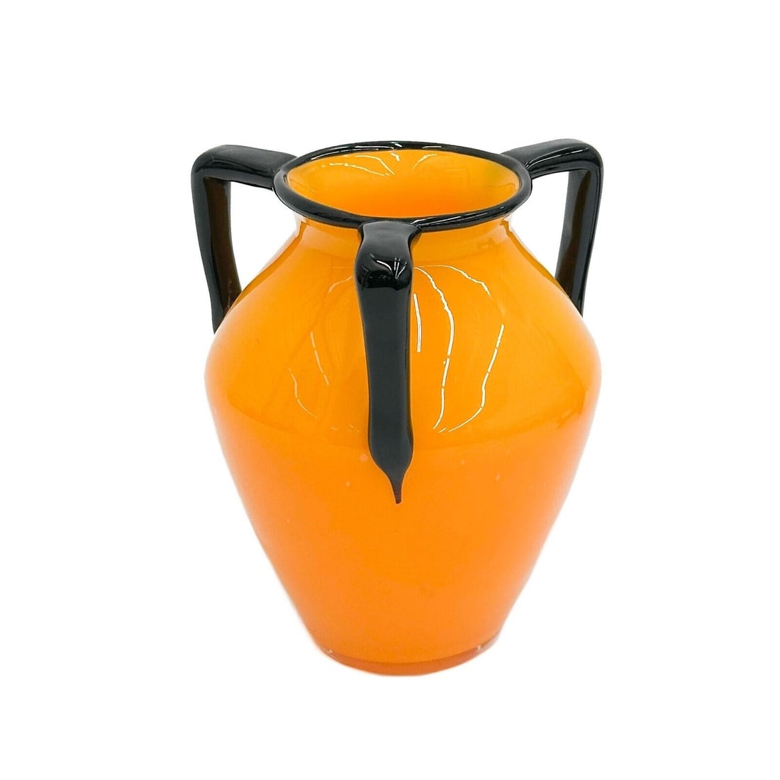 Michael Powolny for Loetz Orange Art Glass 3 Handled Vase Tengo: Michael Powolny for Loetz Orange Art Glass Vase, "Tengo." 3 applied black handles. Polished pontil to the underside. Weight: Approx. 1 lb Measurements: Approx. 4.75 inches diameter x 5.5 inches tall D