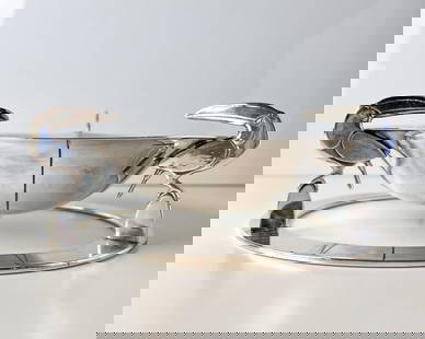 Erik Magnussen for Gorham Art Deco Sterling Silver Footed Bowl with Macaws: Erik Magnussen for Gorham Art Deco Sterling Silver Footed Bowl with Macaws. Gilt beaks. Makers and designer marks on base. A14019. Measurements: Approx. 656grams; 21ozt. Bowl 6.75 in diameter; base 7.