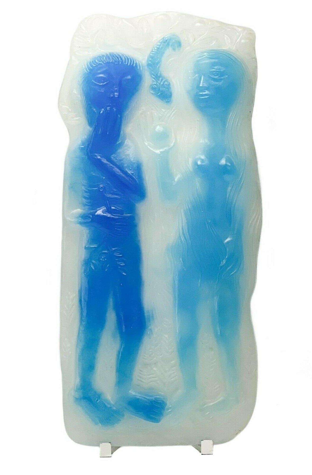 Daum Pâte de Verre Sculpture Paradis Adam & Eve Toulhoat Limited Edition/150: Limited Edition Daum France pâte de verre sculpture,"Paradis" by Pierre Toulhoat. White panel sculpture featuring the figures of Adam and Eve and the serpent in shades of opalescent blue with foliate