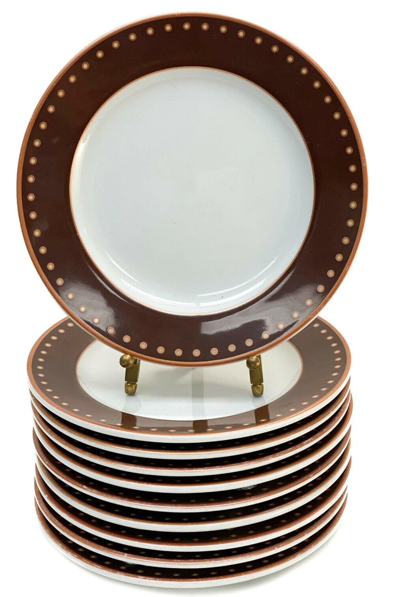 10 Bernardaud French Porcelain Bread Plates: 10 Bernardaud French Porcelain Dinner Plates #C992. A brown ground to the rim with circles to the edge. Bernardaud mark to the underside base. Weight: Approx. 8 lb Measurements: Approx. 6.5 inches dia