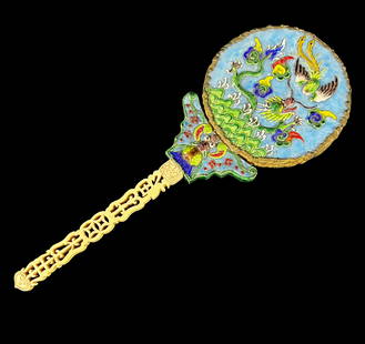 Chinese enameled hand mirror: Chinese enameled hand mirror. Bas relief Phoenix and Dragon motif, with butterfly. Gilt bronze trim. Reticulated ivory handle. beveled mirror. c Republic period.11 inches length x 4 in x0.5 inches Dom