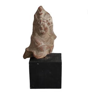 Archaic Greco Roman Terracotta Figure Fragment, Woman: Archaic Greco Roman Terracotta Figure Fragment, Woman. Mounted to modern wood plinth. .25lb Measurements: Approx. 4" height w/out base. 6.125" height with base. Condition: Condition commensurate with