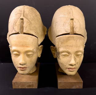 Pair of Cast stone busts Egyptian Pharoah Akhenaten: Pair of Polychrome cast stone busts of Akhenaten, Egyptian Pharaoh. Replica of the 18th dynasty bust in the Kestner Museum. Mounted on wood base. Head pieces are separate from heads. c 20th century. 2