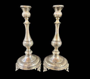 Pair Vintage Hazorfim Sterling Silver footed Shabbat Candlesticks mid century: A pair of Vintage Hazorfim Sterling Silver footed Shabbat Candlesticks, hand chased details, each candlestick with three c-scroll feet. Mid - later 20th Century. Makers mark and marked 925 on rim near