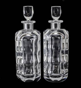 Pair of Sven Palmqvist Orrefors Modernist Art Glass Decanters 2508 cut panels: Pair of Vintage Modern Orrefors Modernist Art Glass Decanter 2508-111 Undulating effect with flat side panels. Signed on base. 8lbs Measurements: Approx. 10.5inches height x 3.25inches x 3.25inches Co