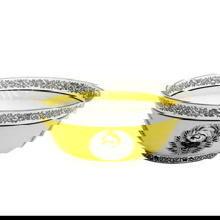 Wedgwood England Porcelain Celtic Ornaments Bowl Yellow: Wedgwood England Porcelain Celtic Ornaments Bowl. A yellow ground with black and white bird decoration. Designed by Daisy Makeig Jones. Interior decoration appears to be intentionally light. Underside