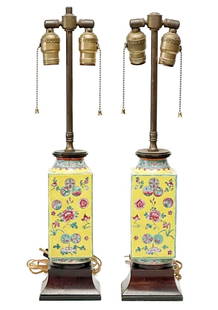 Pair Chinese Yellow Enameled Porcelain Vases Mounted as Lamps, Wood Mounts: Pair Chinese yellow enameled porcelain vases mounted as lamps. Porcelain vases, an enameled yellow ground with floral decoration. Wood mounts. Later converted into lamps. Tested with light bulbs and a